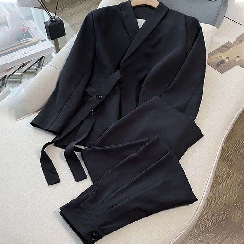 Dvodelni ženski komplet - suknjič z zavezovanjem spredaj in široke hlače-SI